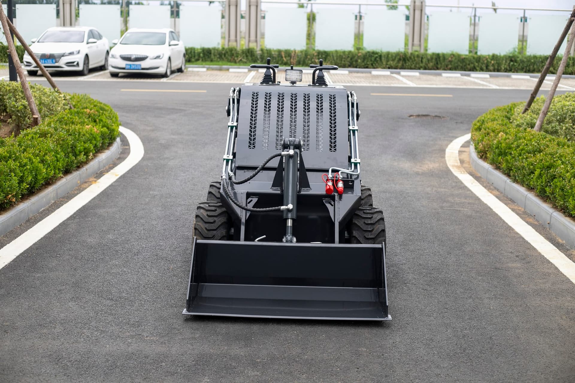 S460 wheeled skid steer loader front view with bucket
