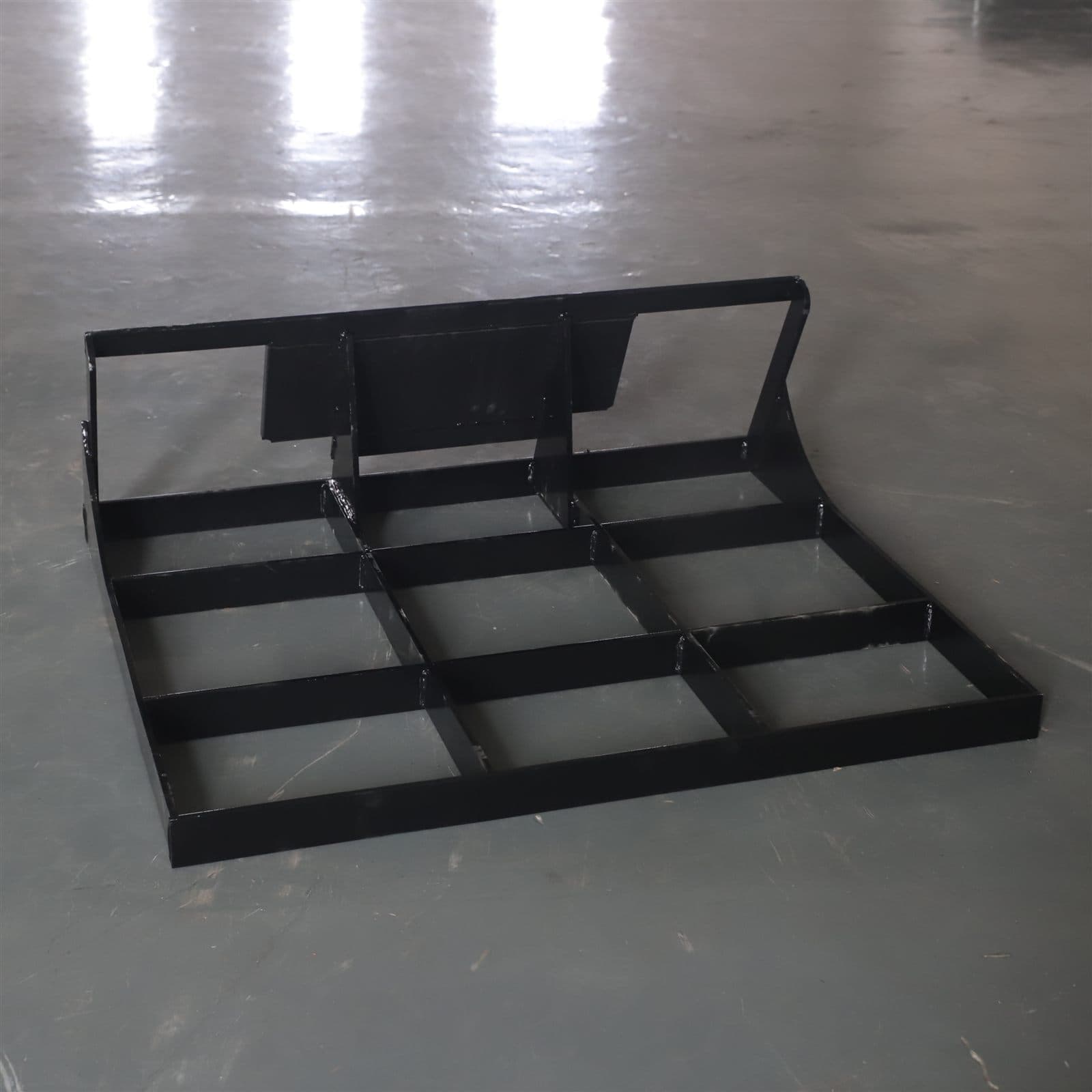 Grading blade attachment for skid steer loader