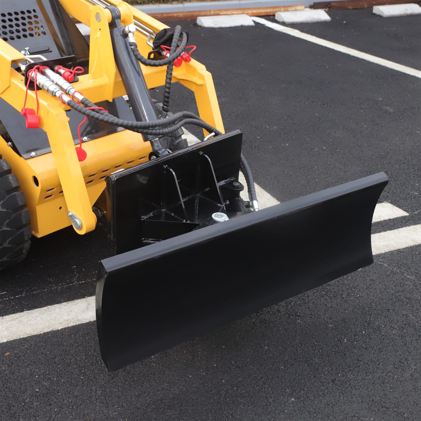 Snow blade attachment for skid steer loader