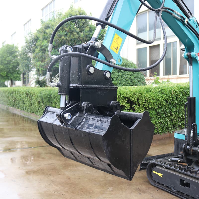 Clamshell bucket mounted on compact excavator