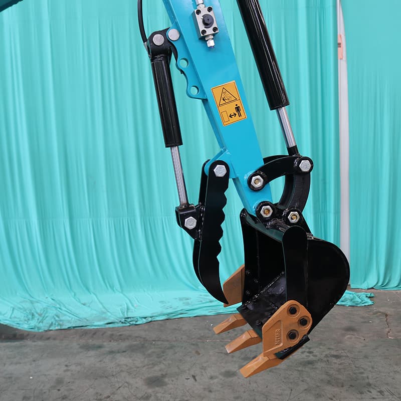 Hydraulic thumb clamp handling material with compact excavator
