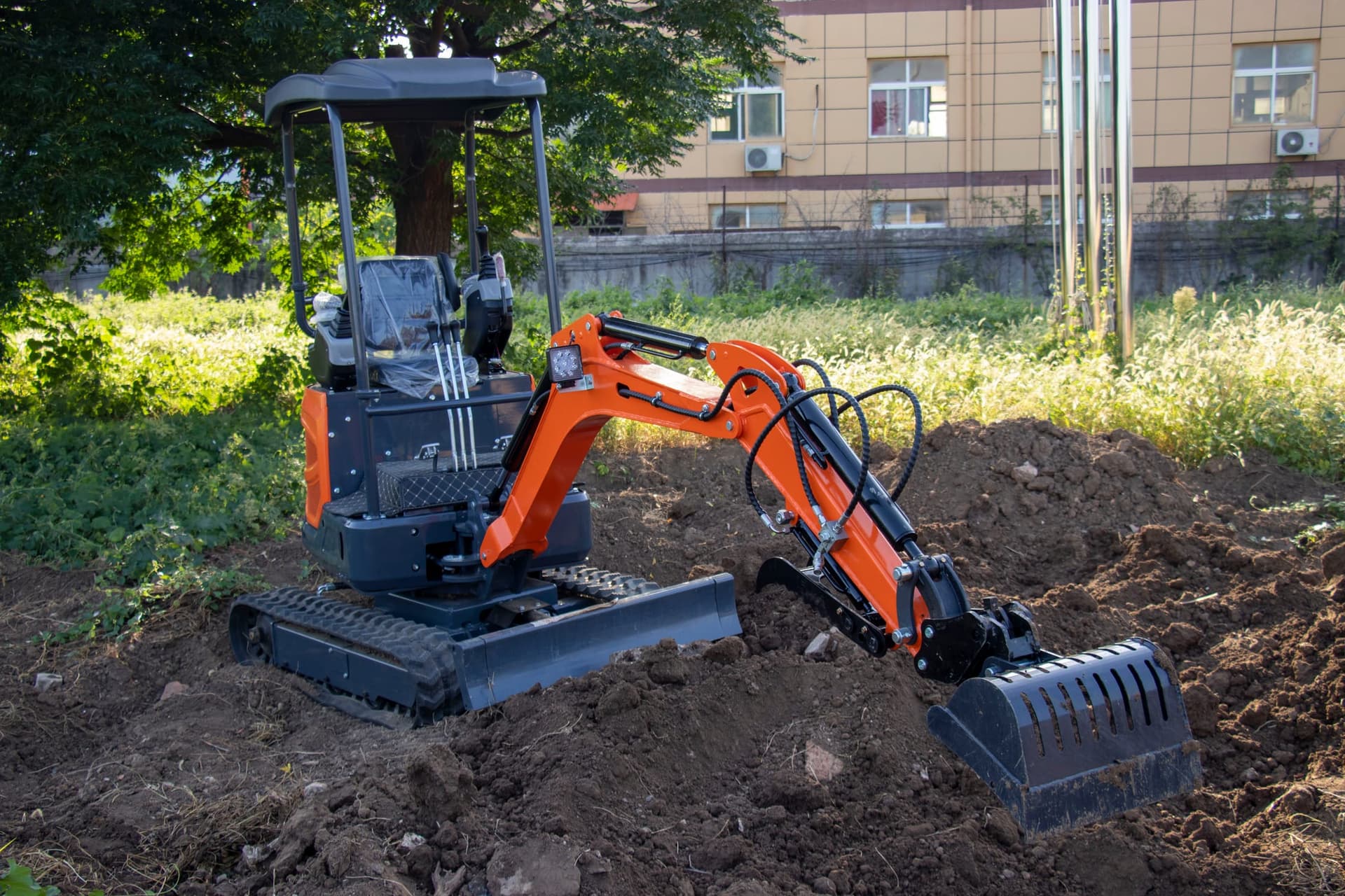 Screening bucket sorting material on compact excavator