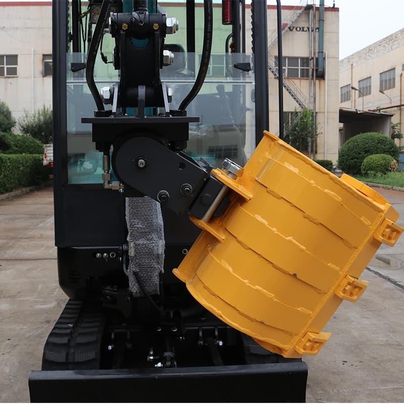 Tilt quick coupler mounted on compact excavator
